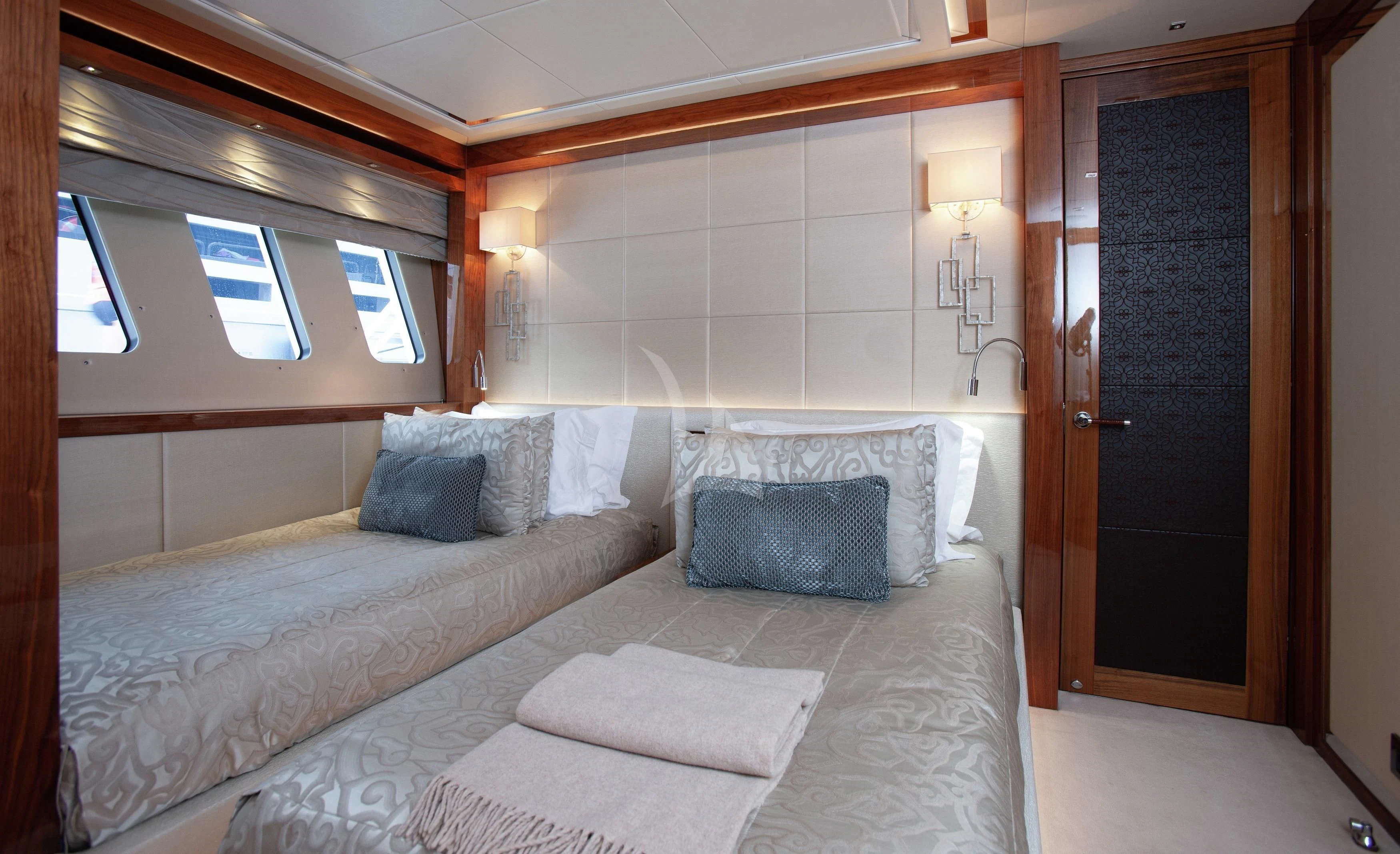 a bed in a room aboard ALESSANDRA III Yacht for Charter
