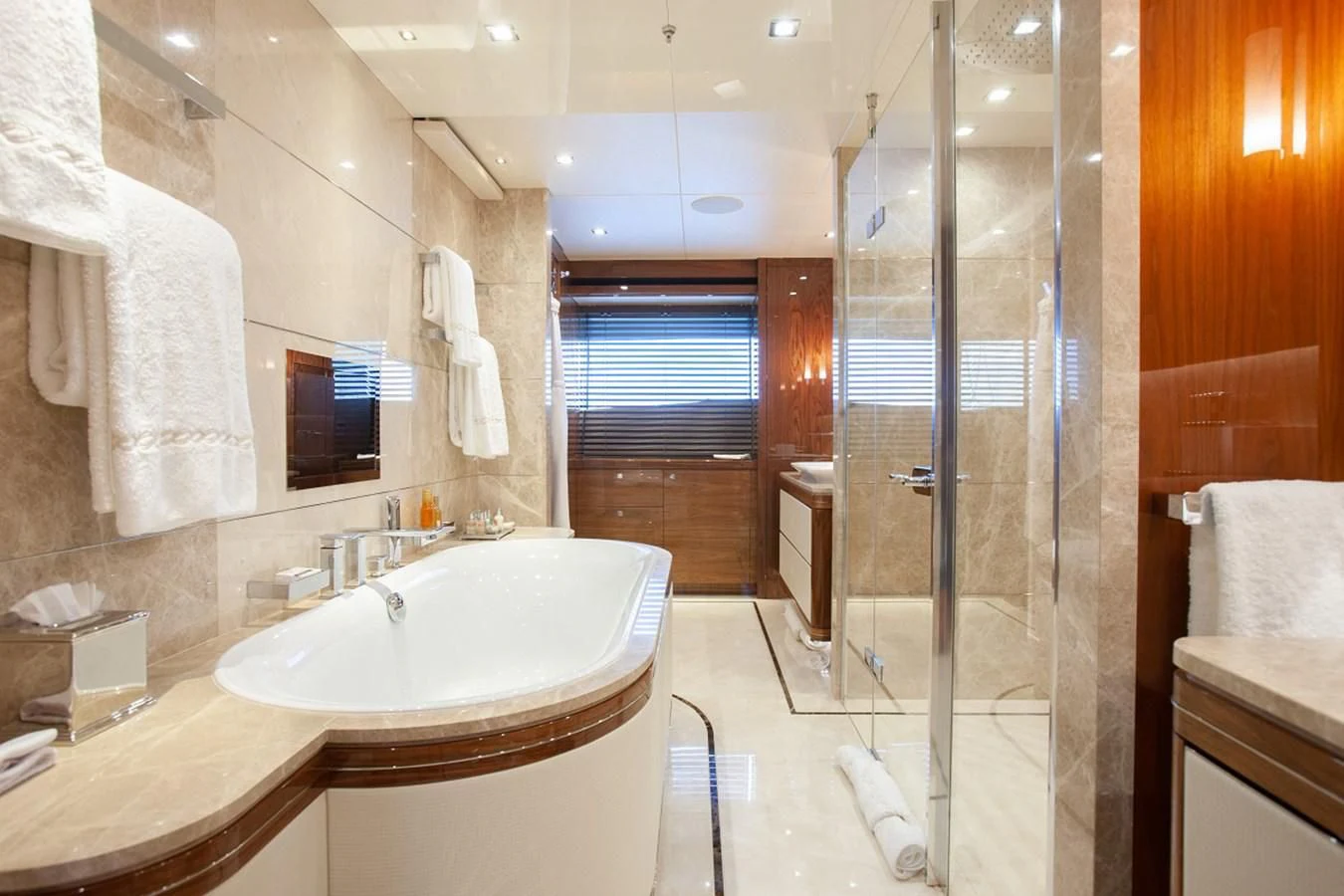 a bathroom with a large glass shower aboard ALESSANDRA III Yacht for Charter