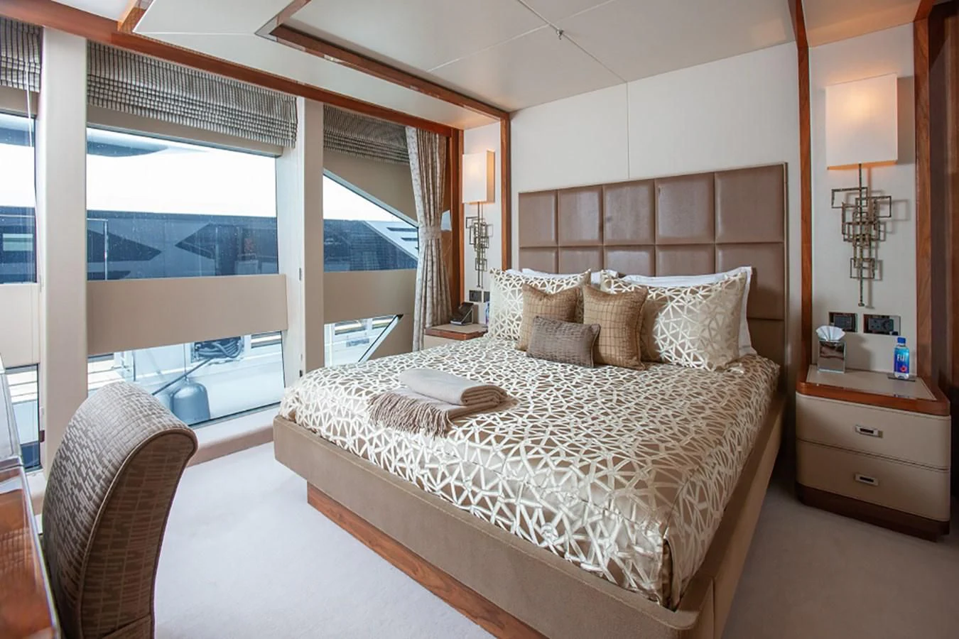 a bed in a room aboard ALESSANDRA III Yacht for Charter