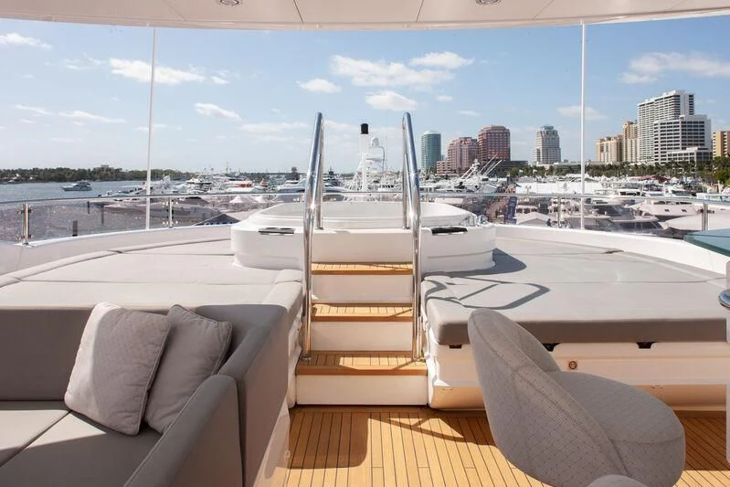 a room with a view of a city and a body of water aboard ALESSANDRA III Yacht for Charter