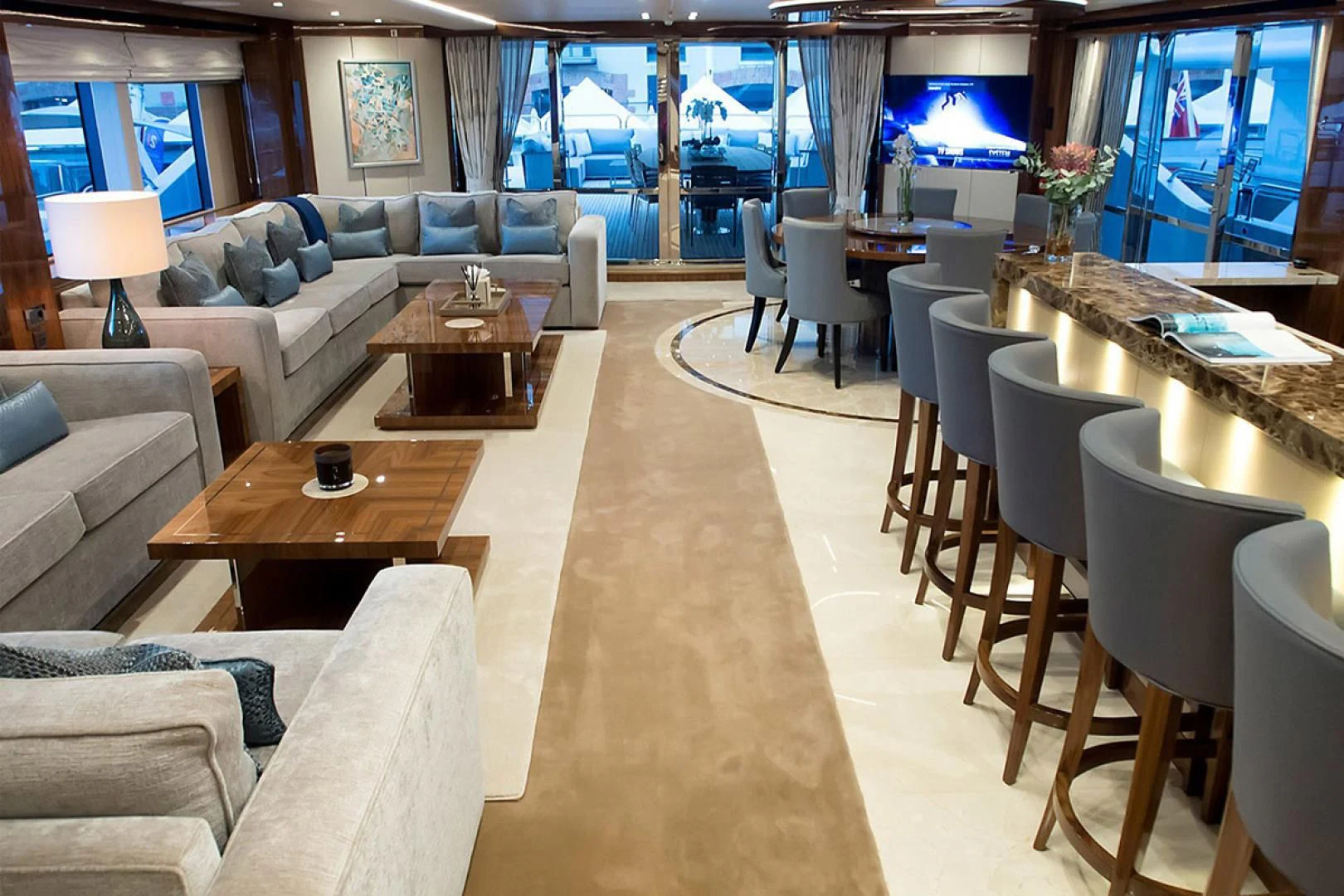 a room with couches and tables aboard ALESSANDRA III Yacht for Charter