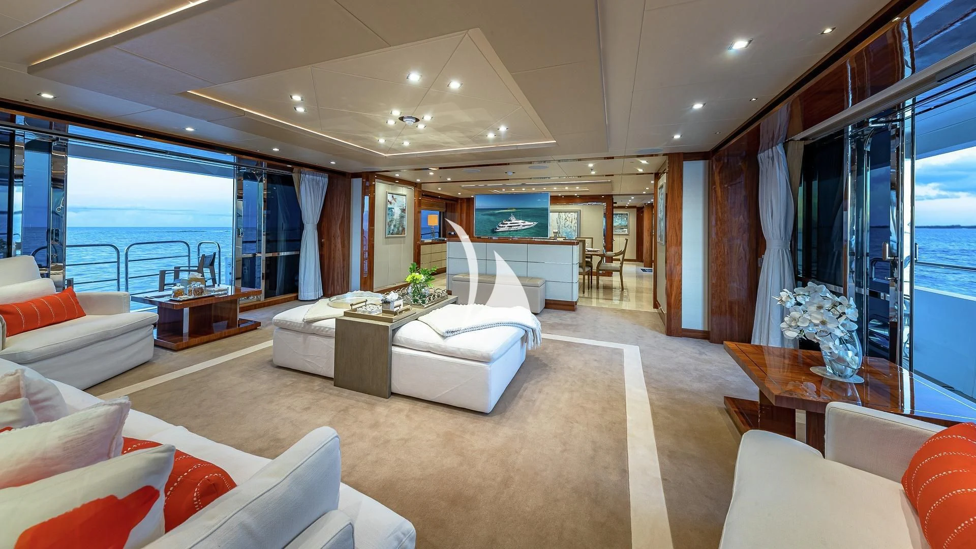 a living room with a large window aboard ALESSANDRA III Yacht for Charter