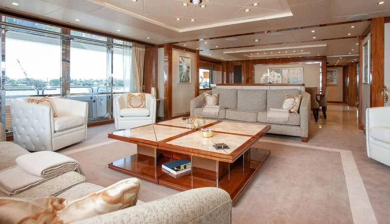 a living room with a large window aboard ALESSANDRA III Yacht for Charter