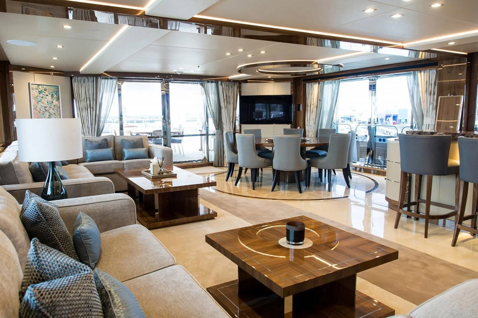 a living room with a large window aboard ALESSANDRA III Yacht for Charter