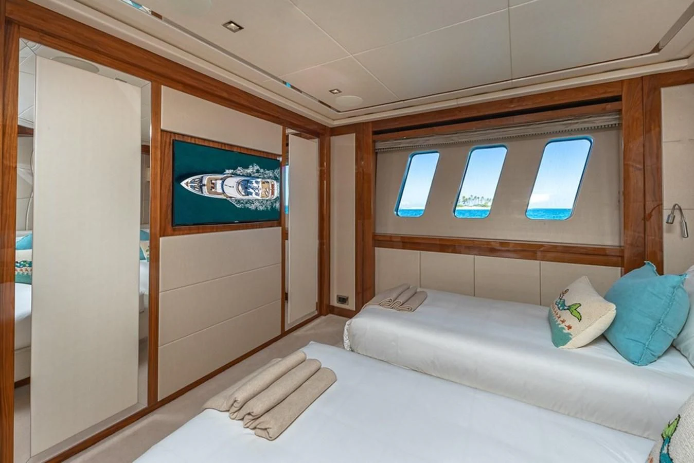 a room with a bed and a window aboard ALESSANDRA III Yacht for Charter