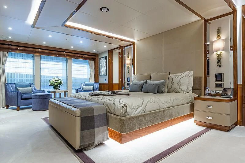 a large bedroom with a large bed aboard ALESSANDRA III Yacht for Charter