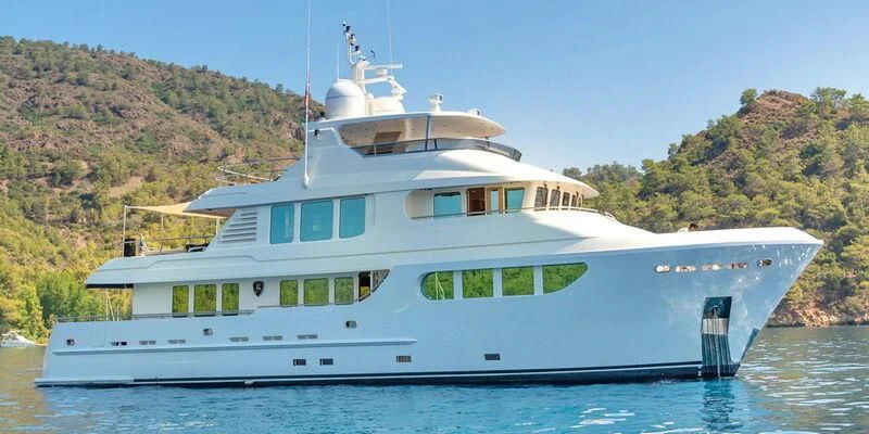 a large white boat on water aboard BANDIDO I Yacht for Sale