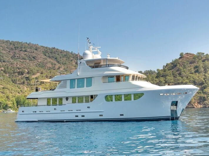 a large white boat on the water aboard BANDIDO I Yacht for Sale