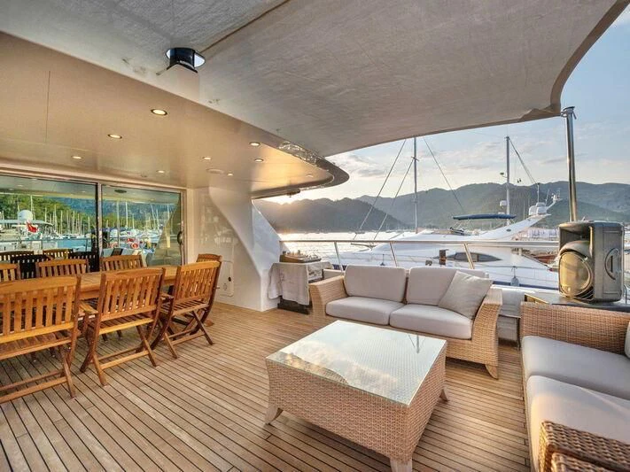 a living room with a large body of water aboard BANDIDO I Yacht for Sale