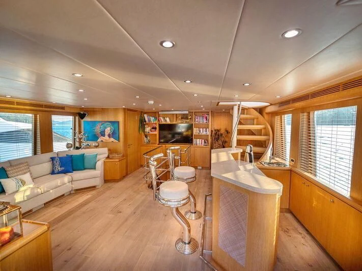 a large kitchen and living room aboard BANDIDO I Yacht for Sale
