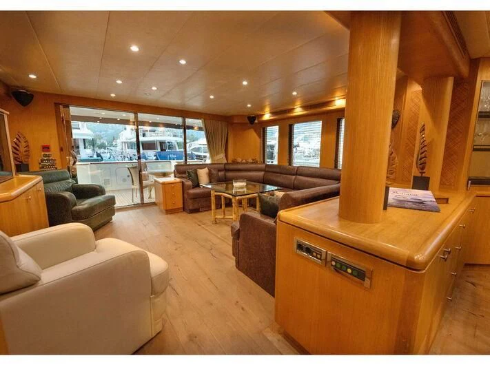 a room with a couch and a desk aboard BANDIDO I Yacht for Sale