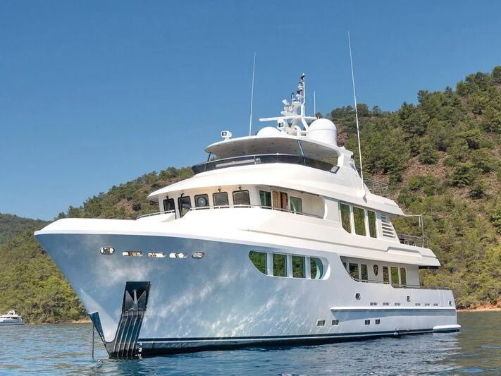 a white boat on water aboard BANDIDO I Yacht for Sale