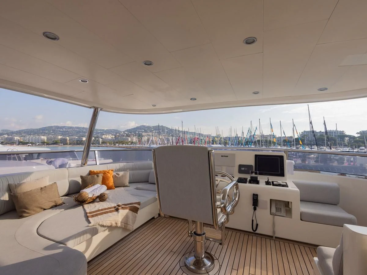 a room with a view of the city and water aboard BANDIDO I Yacht for Sale