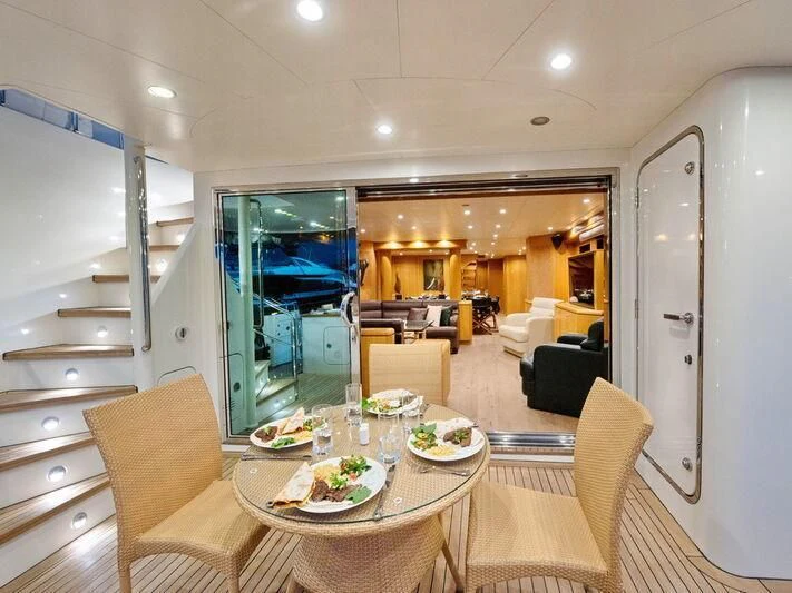 a kitchen and dining area aboard BANDIDO I Yacht for Sale