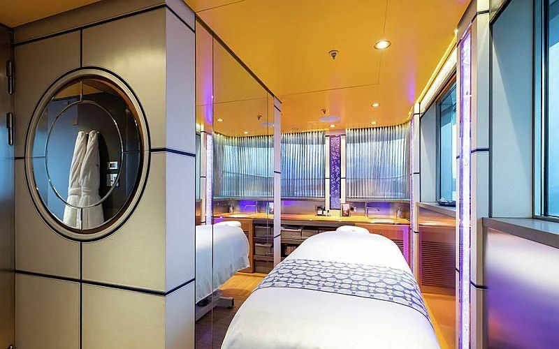 a room with a bed and a window aboard FELIX Yacht for Sale