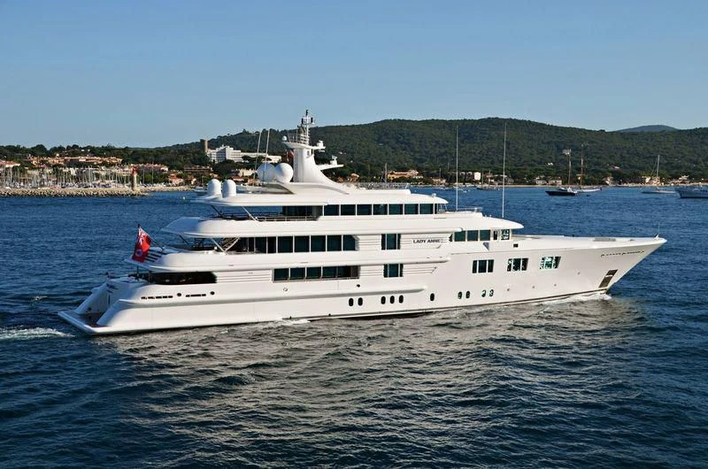 a large white boat in the water aboard FELIX Yacht for Sale