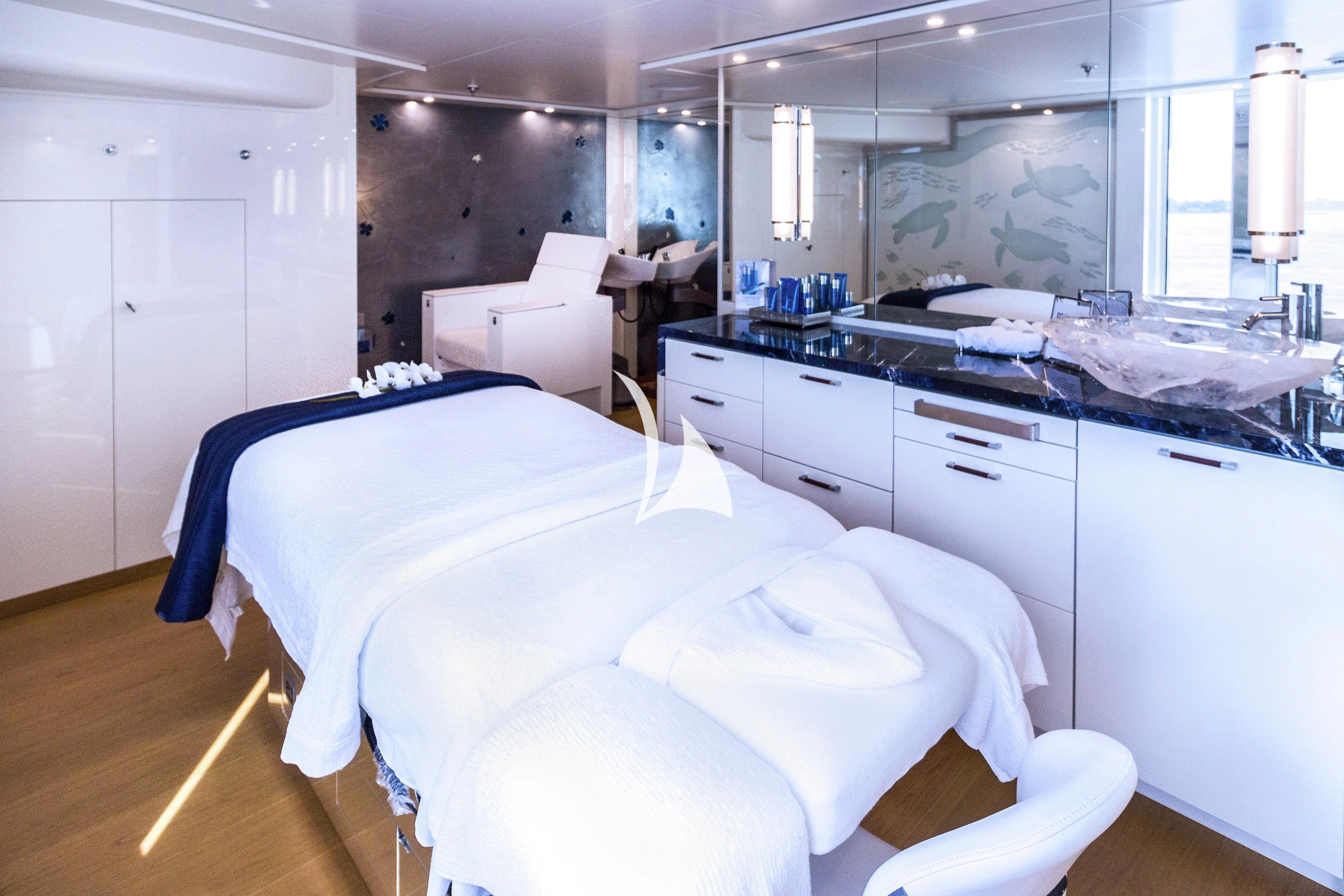 a room with a bed and a sink aboard FELIX Yacht for Sale