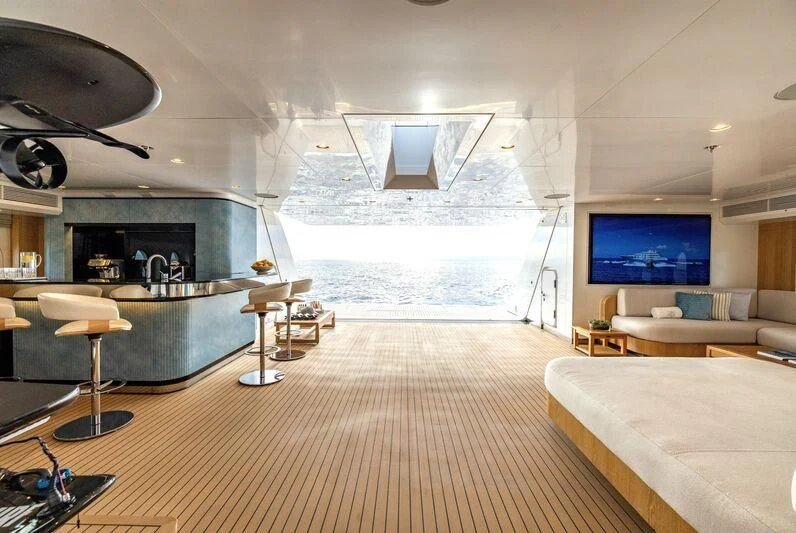 a room with a large tv aboard FELIX Yacht for Sale