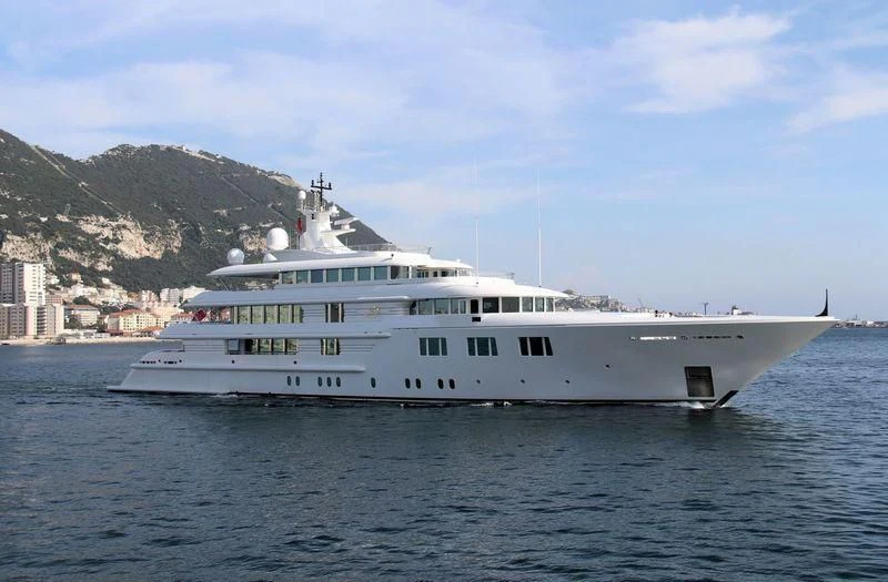 a large white boat in the water aboard FELIX Yacht for Sale