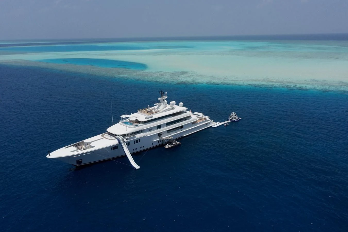 a white yacht in the water aboard FELIX Yacht for Sale