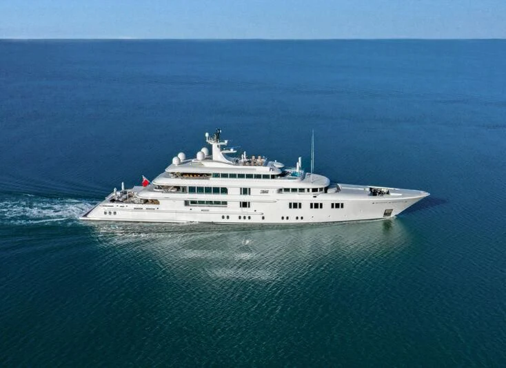 a large white ship in the ocean aboard FELIX Yacht for Sale