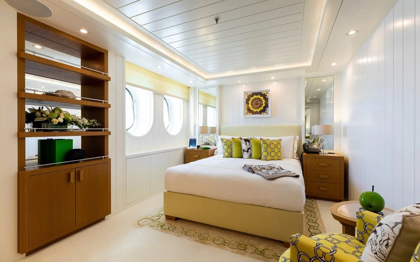 a bedroom with a bed and a shelf aboard FELIX Yacht for Sale