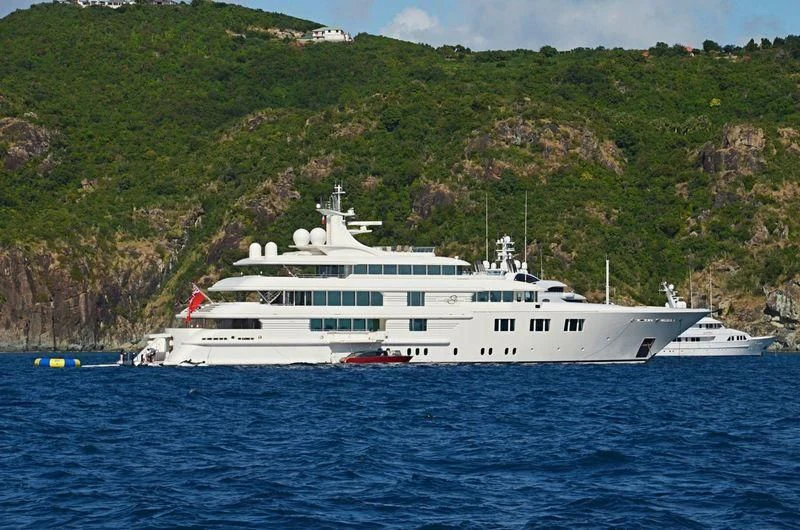 a white boat on the water aboard FELIX Yacht for Sale