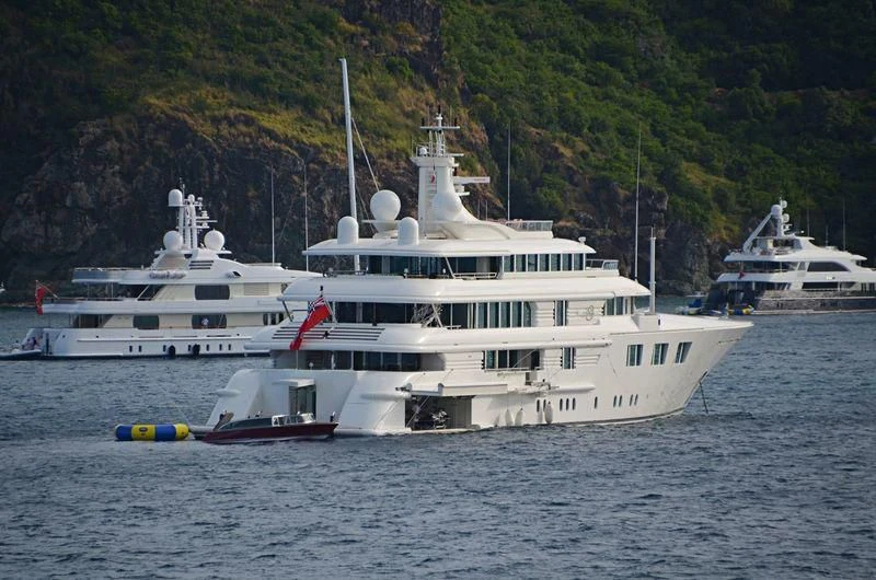 a large white boat in the water aboard FELIX Yacht for Sale