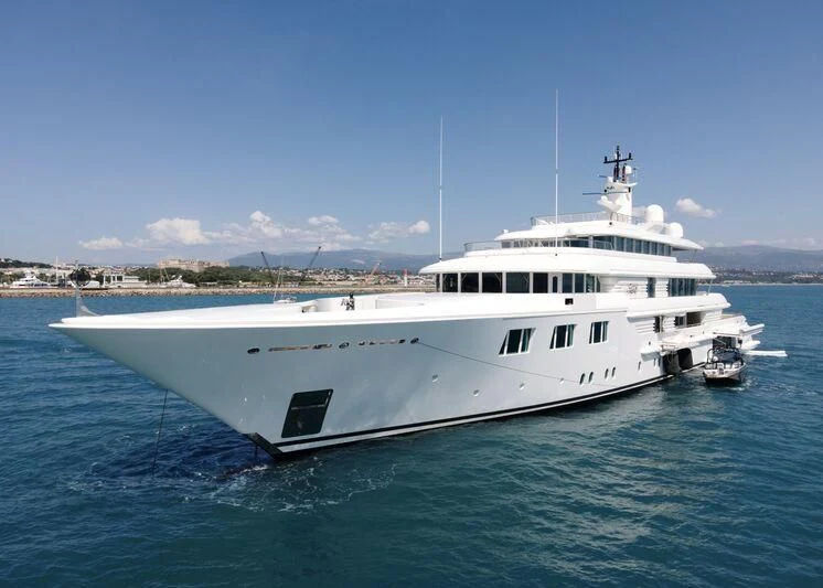a large white boat in the water aboard FELIX Yacht for Sale