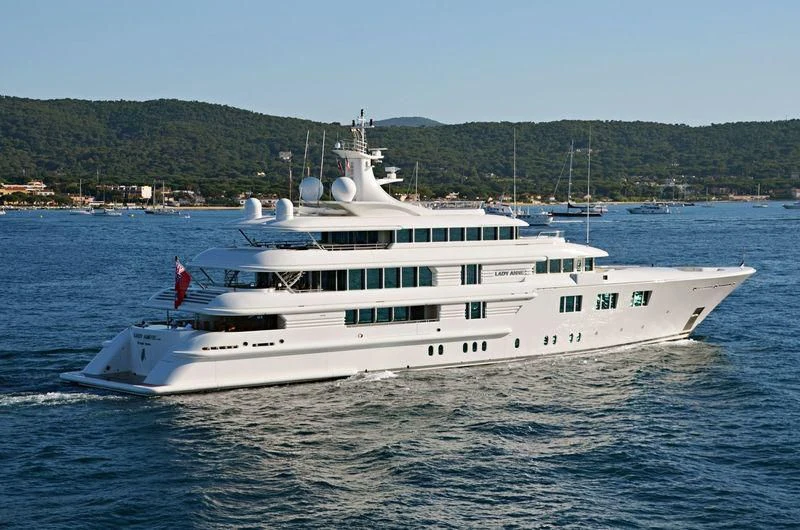 a large white boat on the water aboard FELIX Yacht for Sale