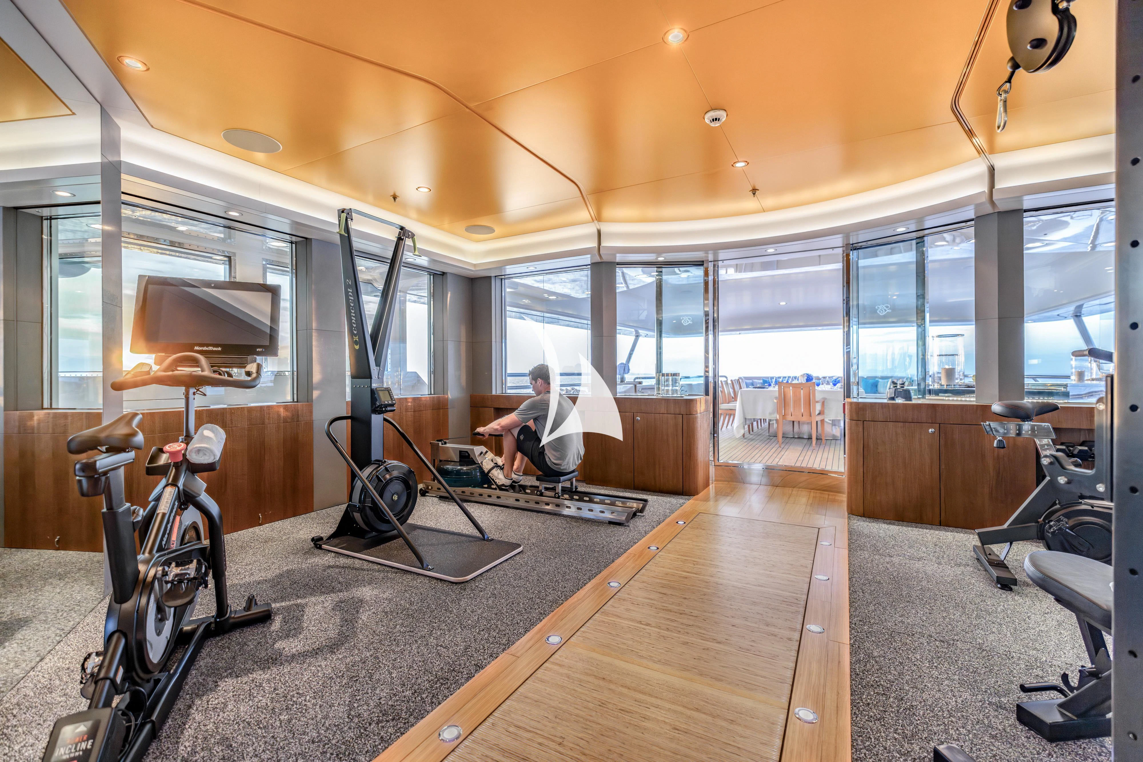 a person working out in a gym aboard FELIX Yacht for Sale