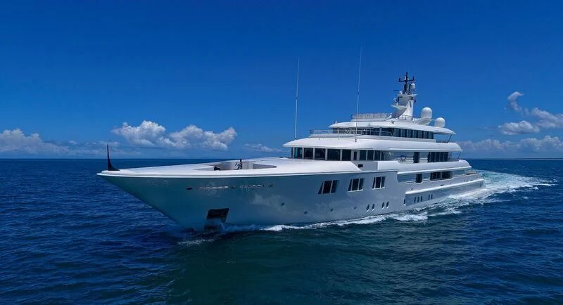 a white boat on the water aboard FELIX Yacht for Sale