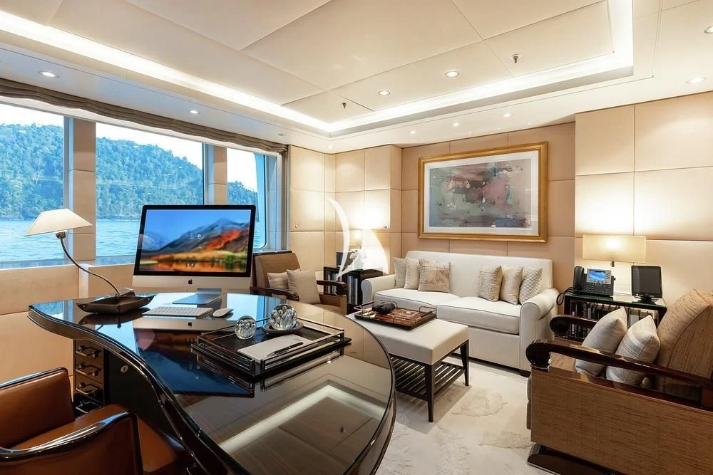 a living room with a large window aboard FELIX Yacht for Sale