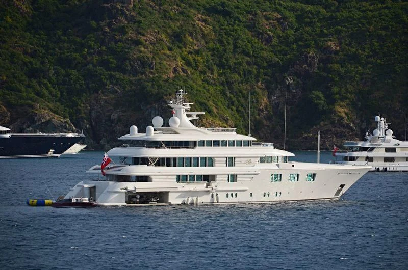 a couple of large boats in the water aboard FELIX Yacht for Sale