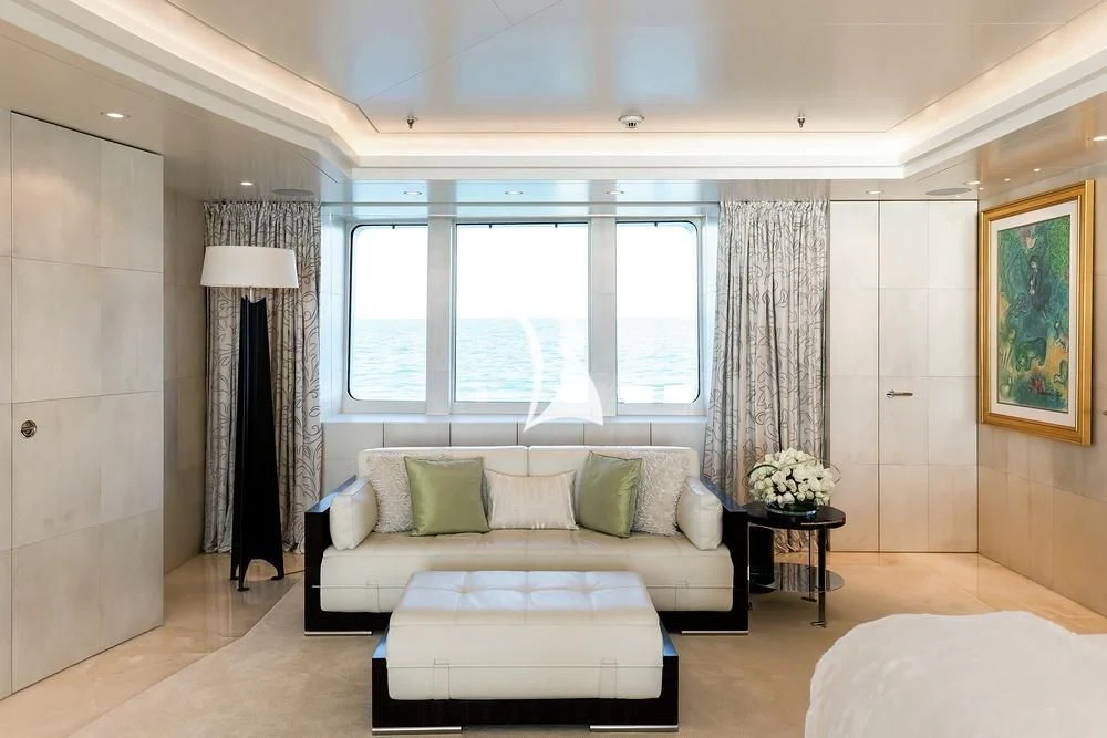 a white couch in a room aboard FELIX Yacht for Sale