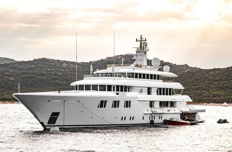 a white yacht on the beach aboard FELIX Yacht for Sale