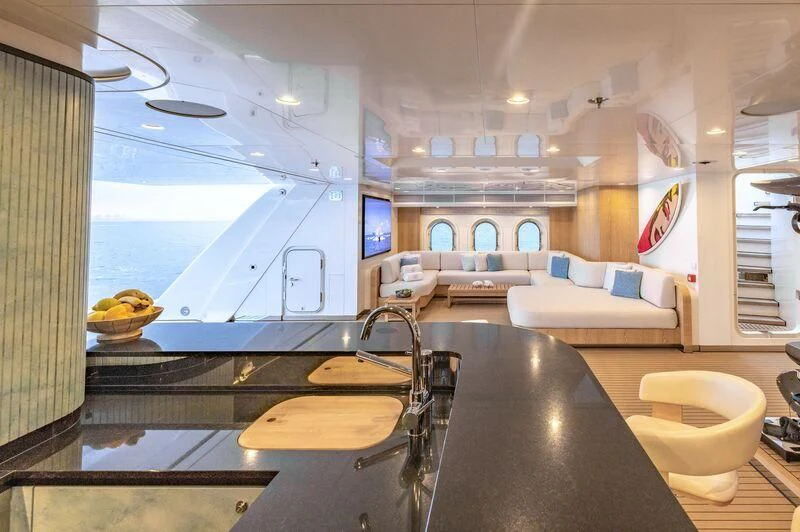 a large kitchen with a large island aboard FELIX Yacht for Sale