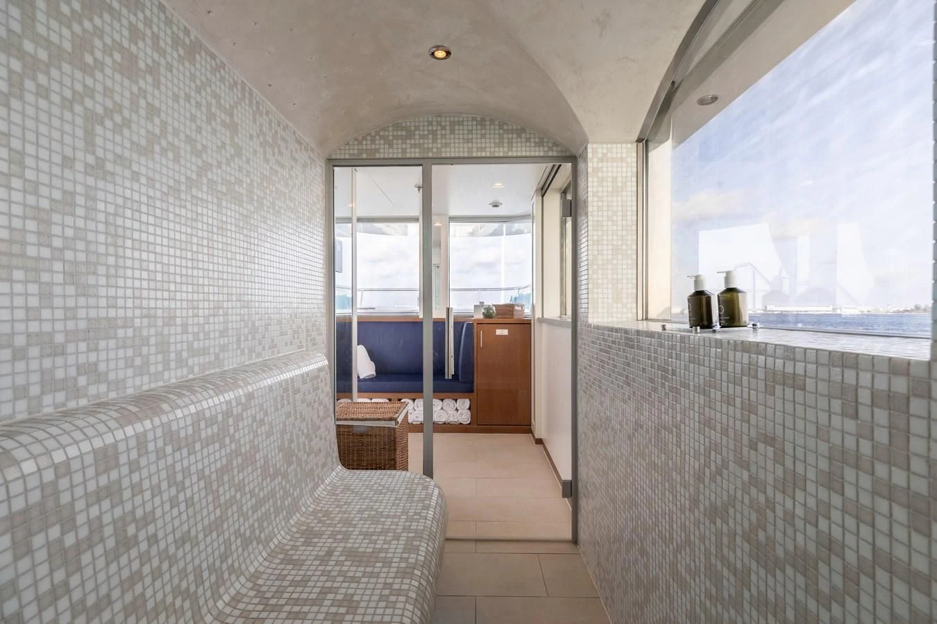 a room with a bed and a window aboard FELIX Yacht for Sale