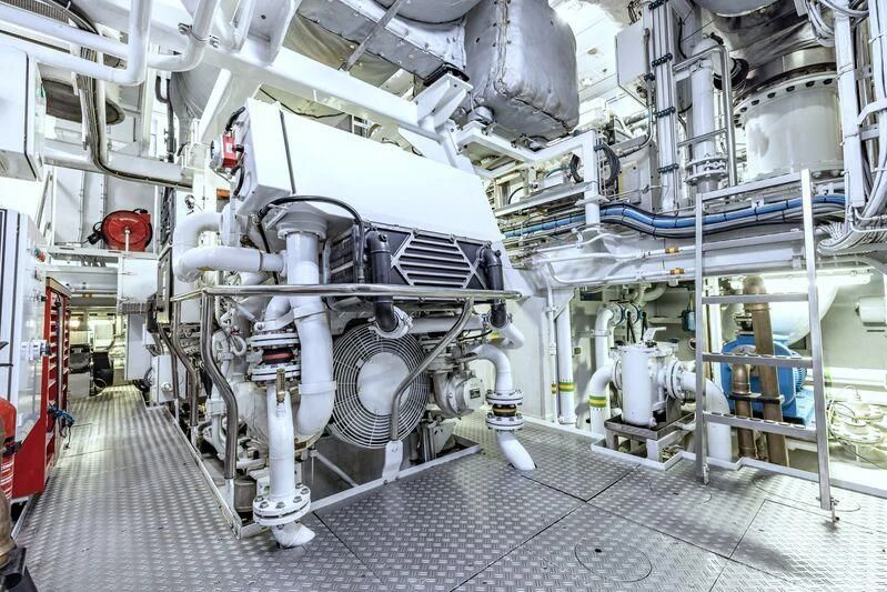 a large white machine aboard FELIX Yacht for Sale