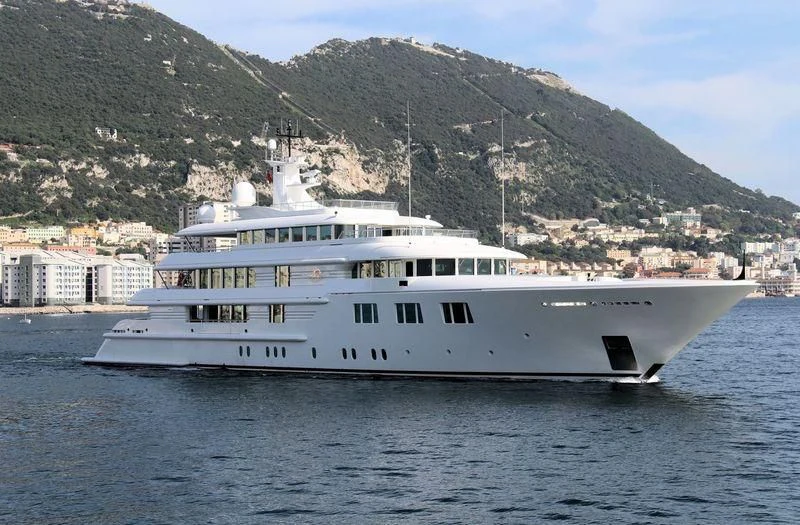 a large white boat in the water aboard FELIX Yacht for Sale