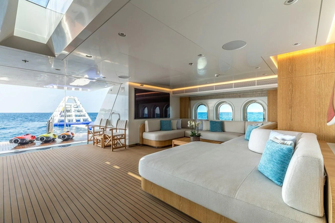 a large living room with a large pool aboard FELIX Yacht for Sale