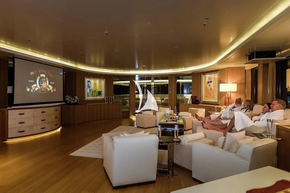 a group of people sitting in a living room aboard FELIX Yacht for Sale