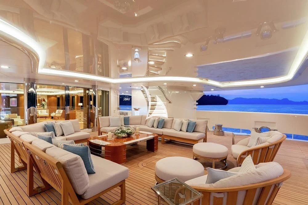 a large living room with a large open window aboard FELIX Yacht for Sale