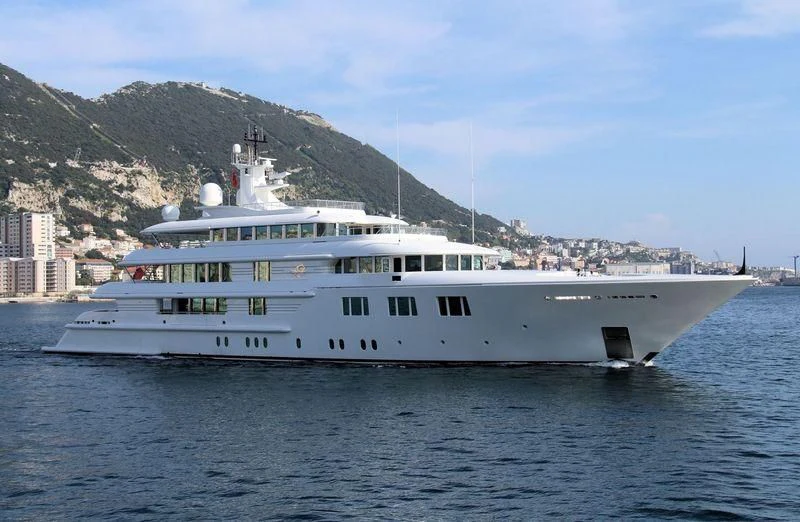 a large white boat in the water aboard FELIX Yacht for Sale