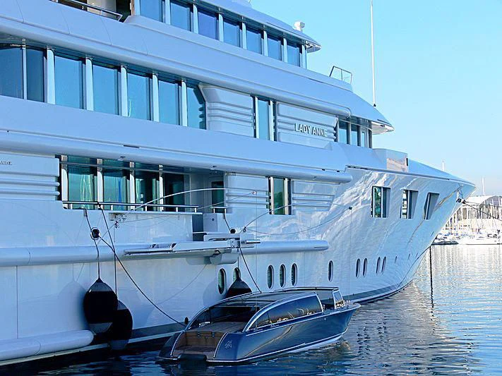 a large white boat on the water aboard FELIX Yacht for Sale