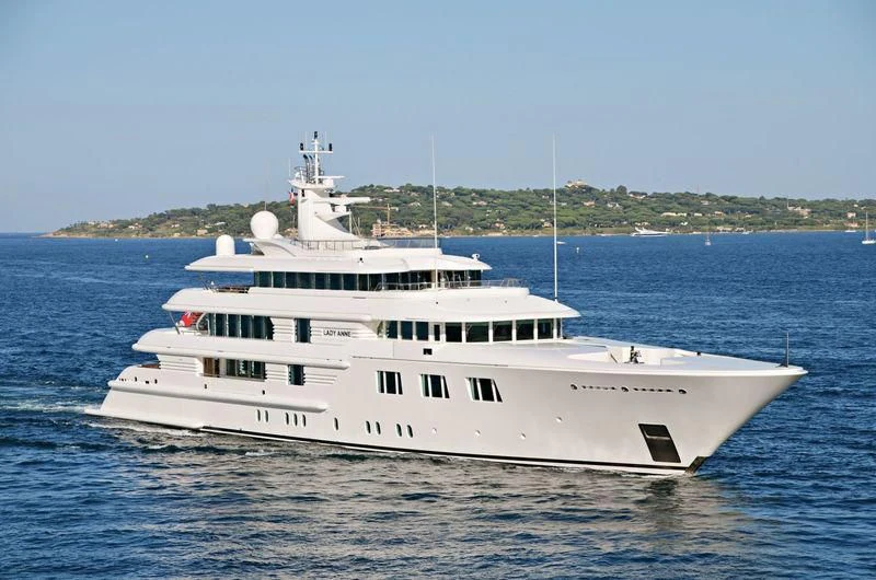 a large white boat in the water aboard FELIX Yacht for Sale