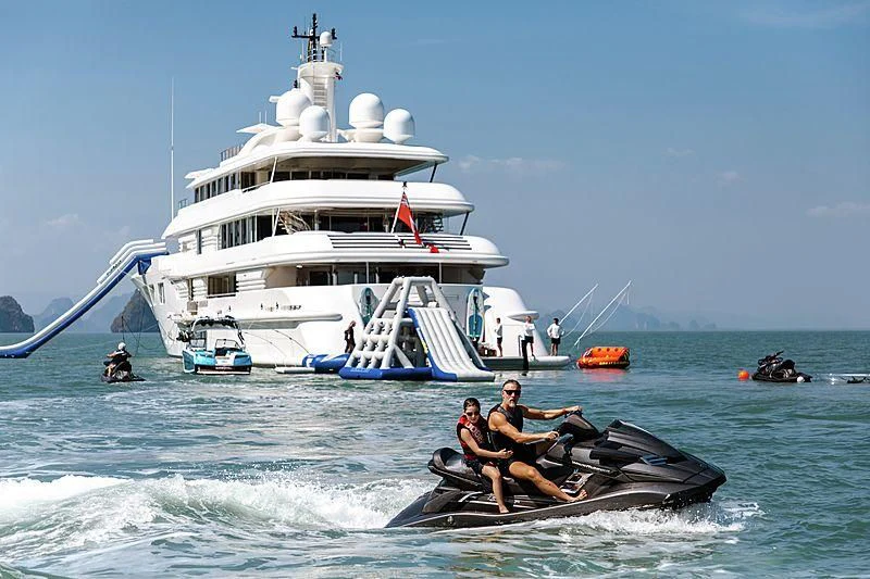 a group of people on a boat in the water aboard FELIX Yacht for Sale