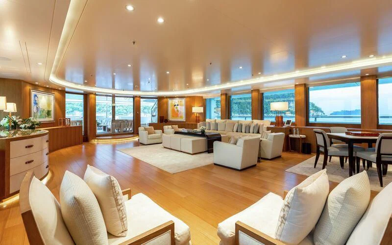 a living room with a large window aboard FELIX Yacht for Sale