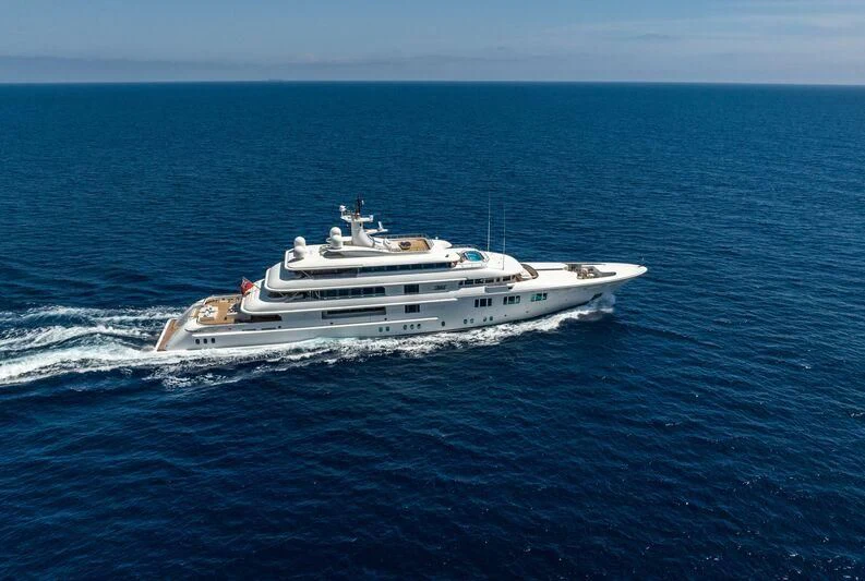 a large white ship in the water aboard FELIX Yacht for Sale