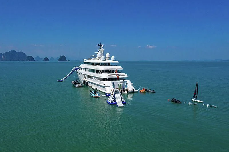 a large white boat in the water aboard FELIX Yacht for Sale